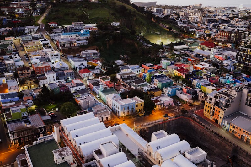 An aerial view of a Cape Town neighborhood with colorful houses