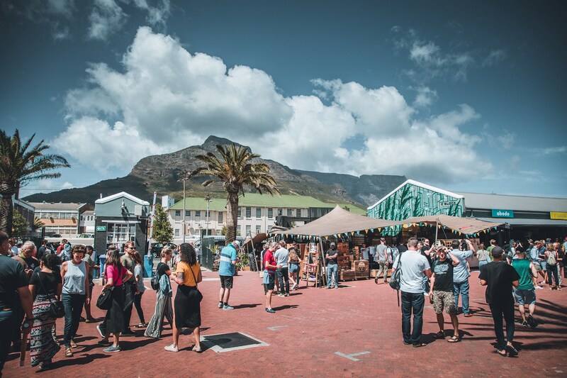 People walking around the Neighbourgoods Market in Woodstock