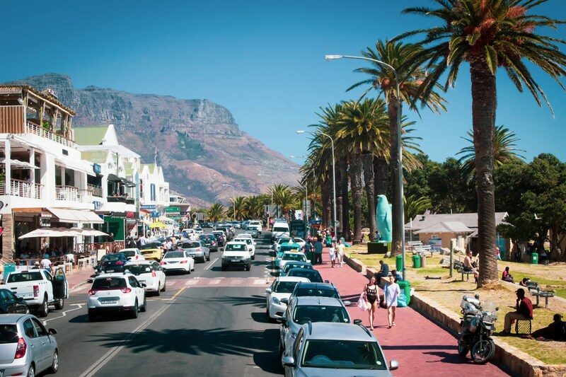 Victoria Road in Camps Bay full of cars and people